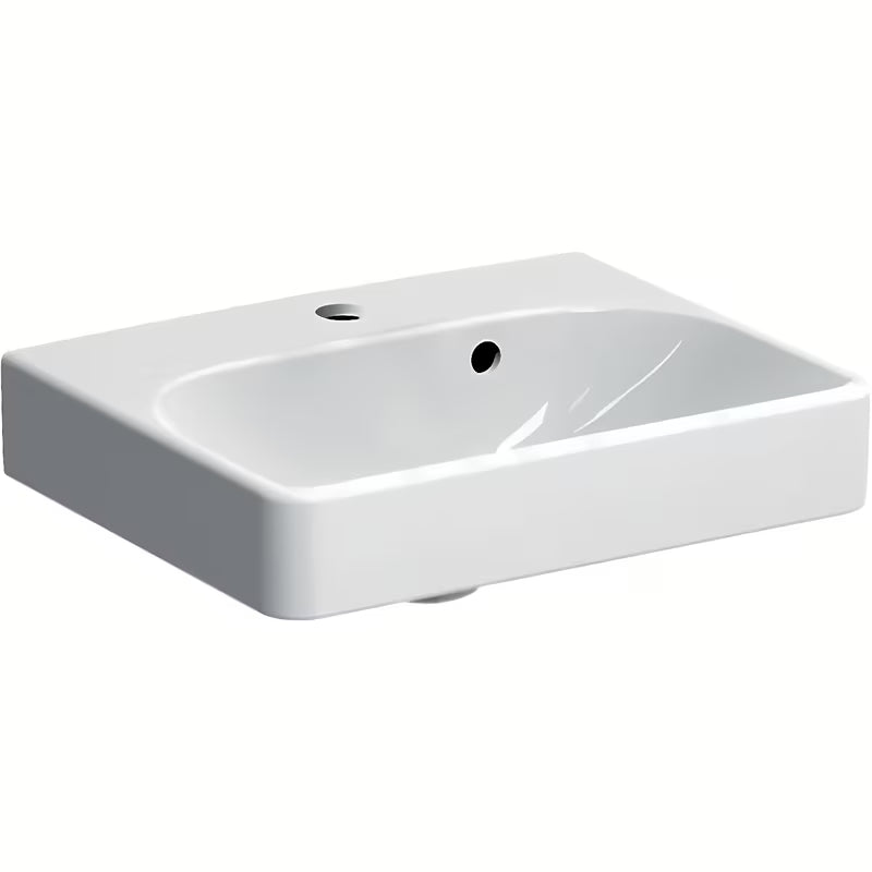 Biała ceramiczna mała umywalka Geberit Smyle Square 45x36 cm z otworem pro na baterię pośrodku.