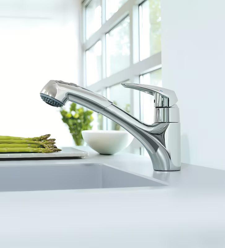 Chromowana bateria zlewozmywakowa Grohe Eurodisc z wyciąganą wylewką z obrotową wylewką