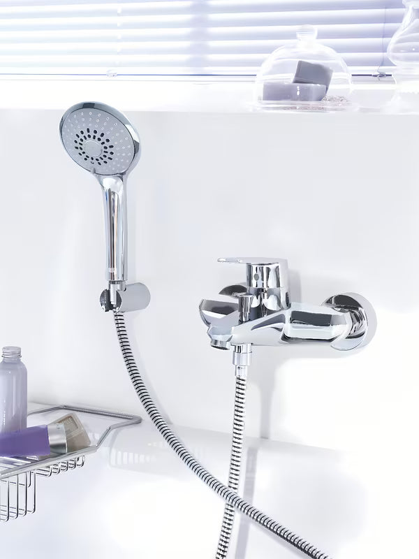 Chromowana ścienna bateria wannowa Grohe Eurodisc z zestawem prysznicowym