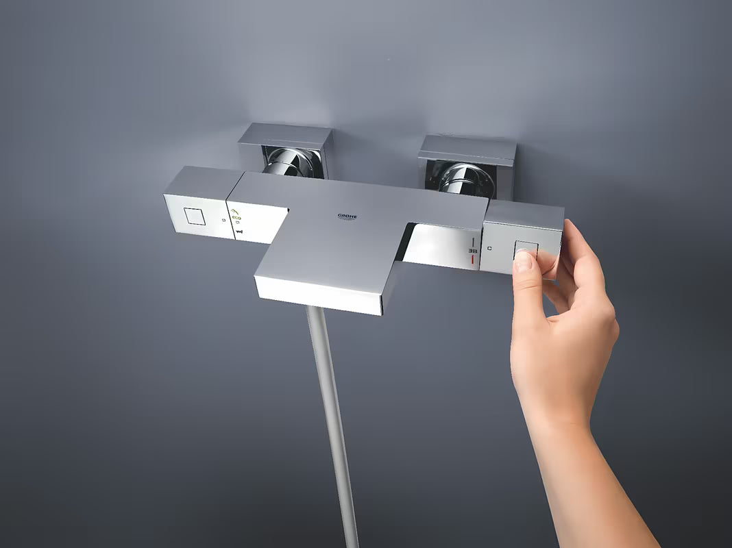 Chromowa termostatyczna bateria wannowa Grohe Grohtherm Cube z XL wylewką GROHE XL Waterfall pro do wanny i prysznica.