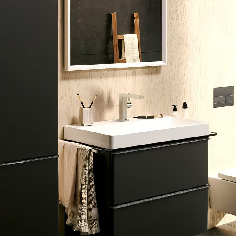 Chromowana jednouchwytowa bateria umywalkowa Hansgrohe Tecturis E z boczną dźwignią i korkiem