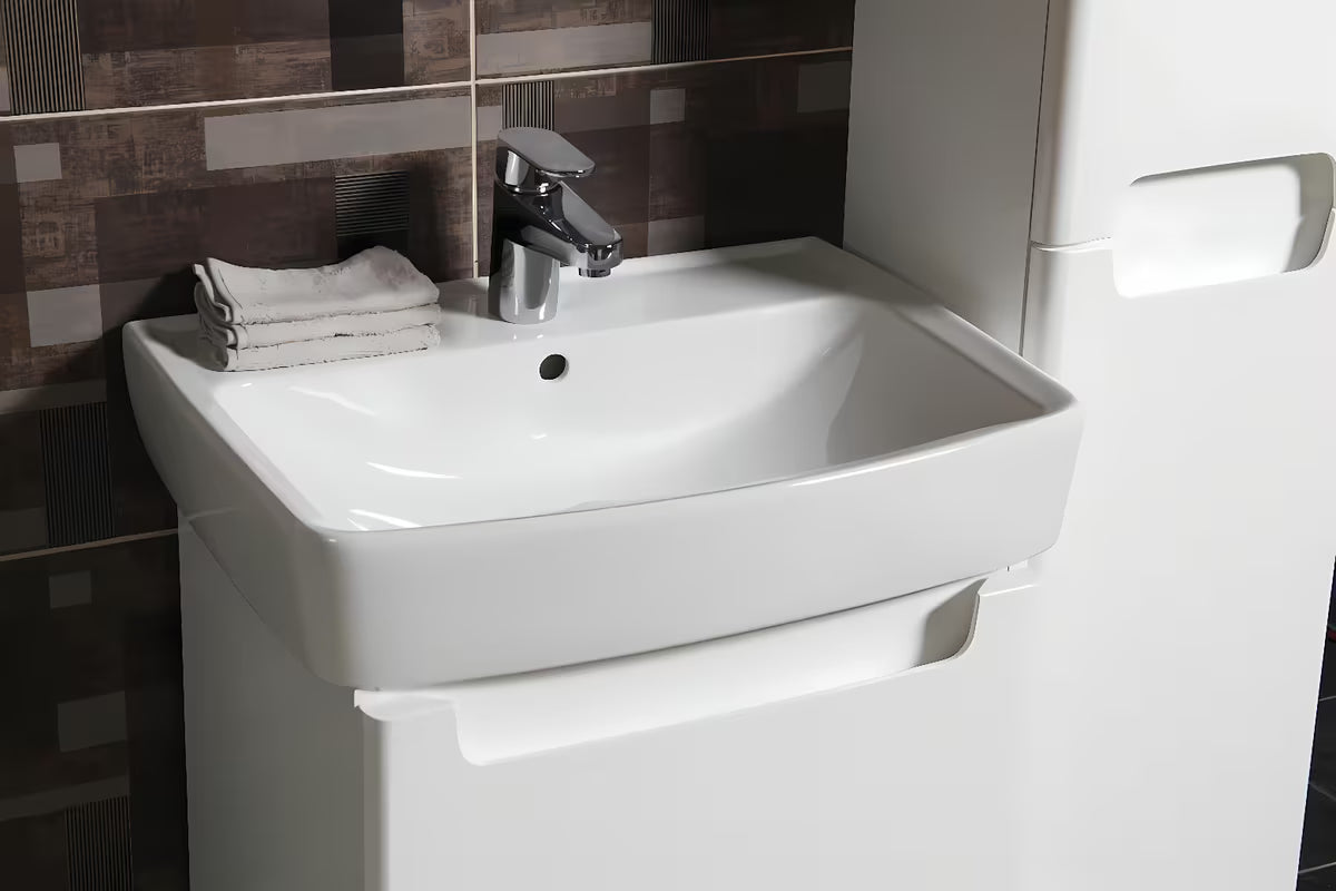 Biała meblowe ceramiczna umywalka Kolo Rekord 60 x 45 cm z otworem na baterię pośrodku