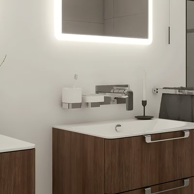 Chromowany uchwyt na szczoteczki Nimco Kibo z ceramicznym kubkiem pro do nowoczesnej łazienki.