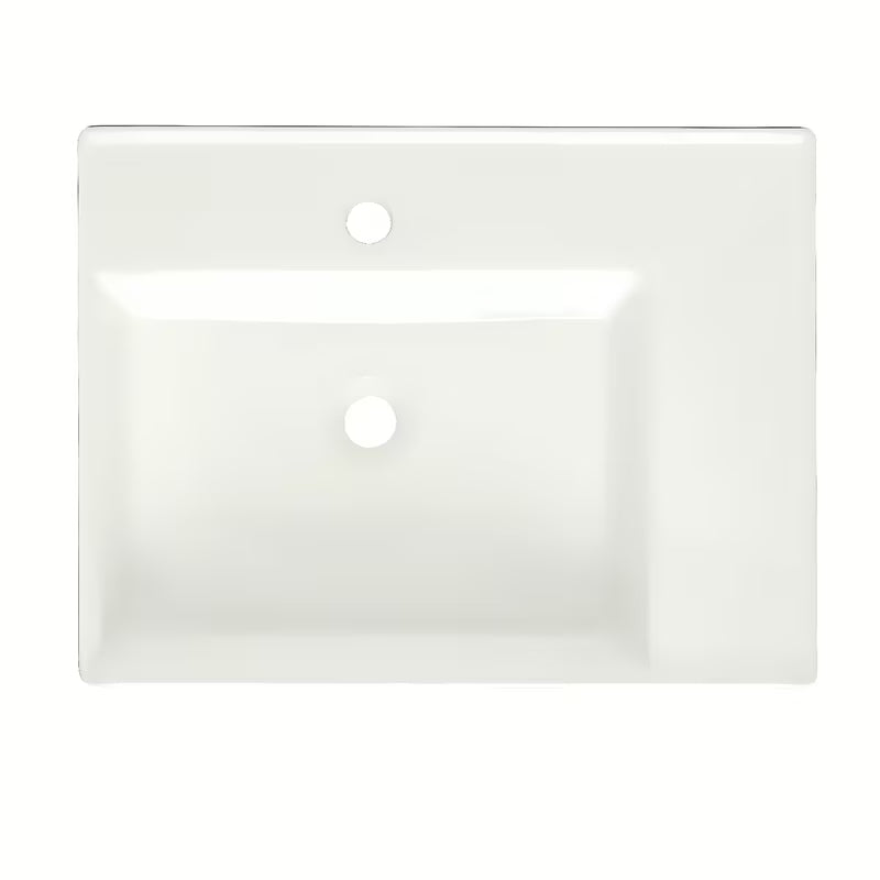 Biała ceramiczna umywalka wisząca SAT Cube Way 60x46 cm o asymetrycznym designie i z półką po prawej stronie.