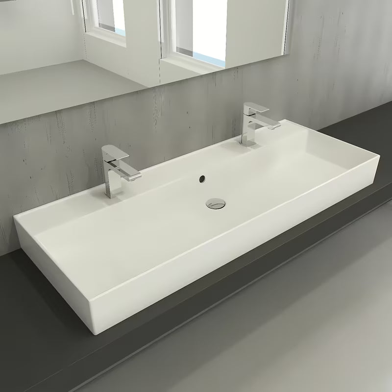 Biała ceramiczna umywalka SAT Infinitio 121,4x46,9 cm z przelewem