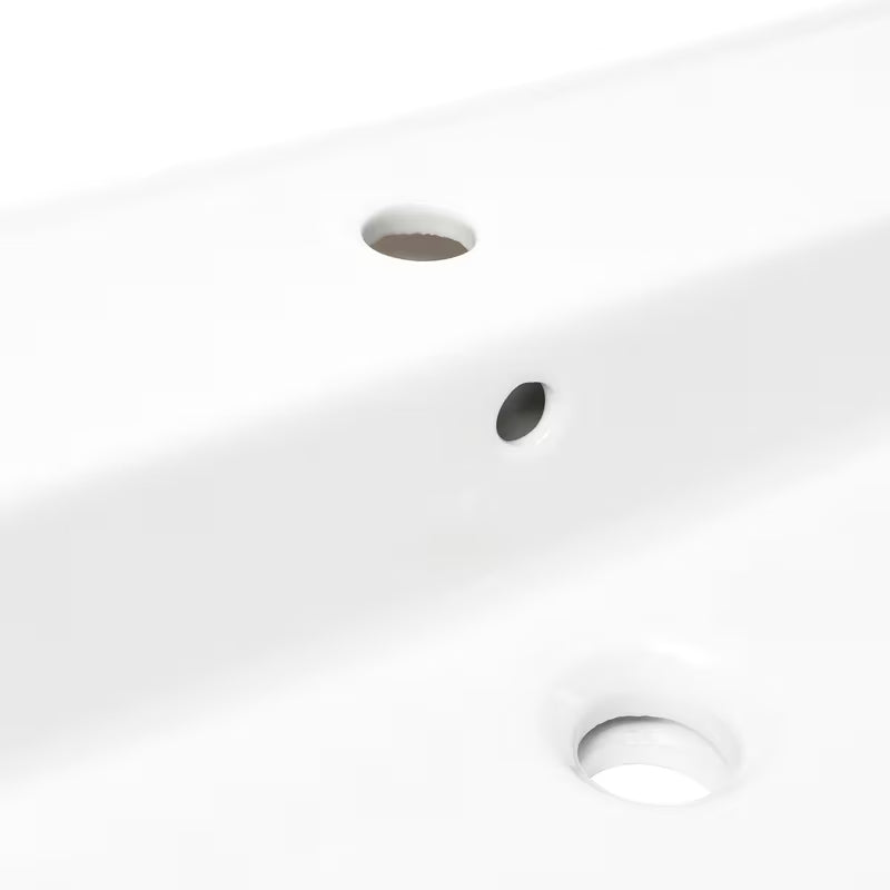 Biała ceramiczna umywalka wisząca SAT Infinitio 60,5x46,5 cm z przelewem i centralnym otworem pro na baterię.