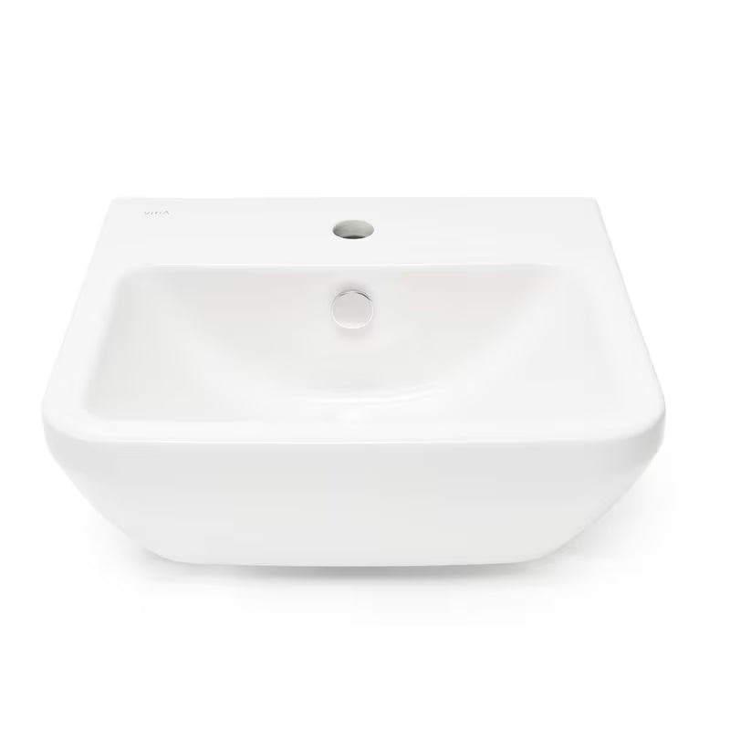 Umywalka wisząca Vitra Integra 50x43 cm z otworem na baterię pośrodku w kolorze białym.