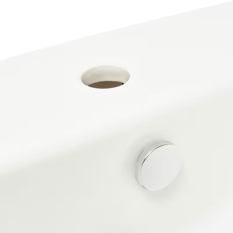 Umywalka wisząca Vitra Integra 50x43 cm z otworem na baterię pośrodku w kolorze białym.