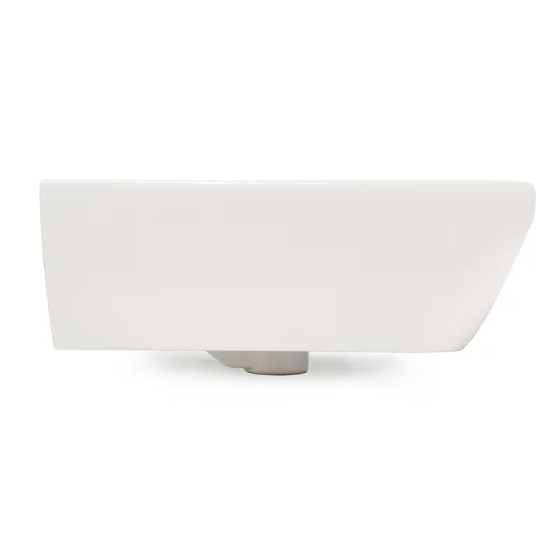 Umywalka wisząca Vitra Integra 50x43 cm z otworem na baterię pośrodku w kolorze białym.