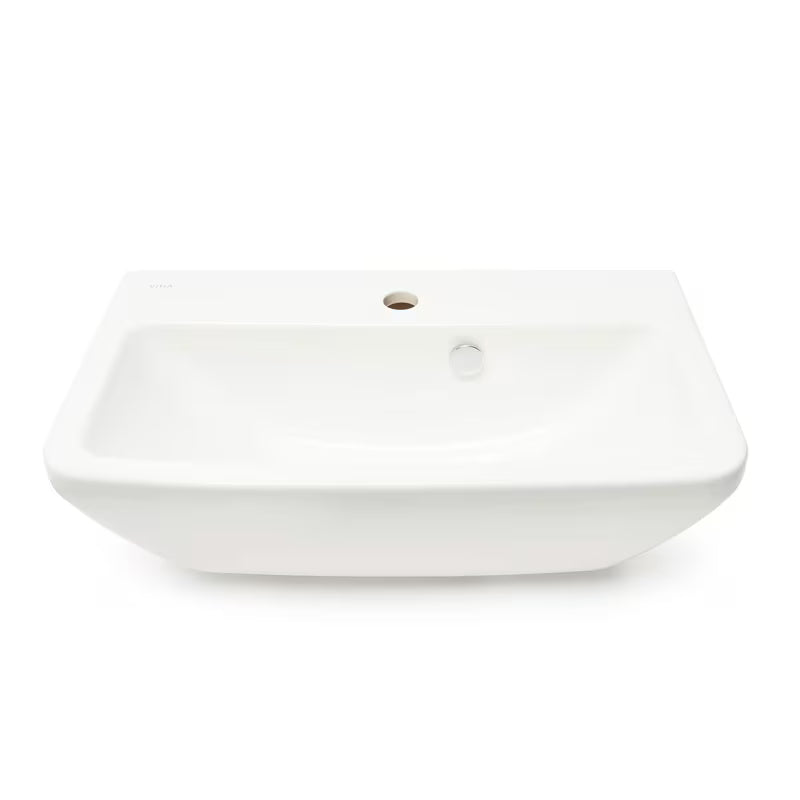 Biała umywalka wisząca Vitra Integra 60x36 cm z ceramiki z otworem na baterię pośrodku i przelewem.