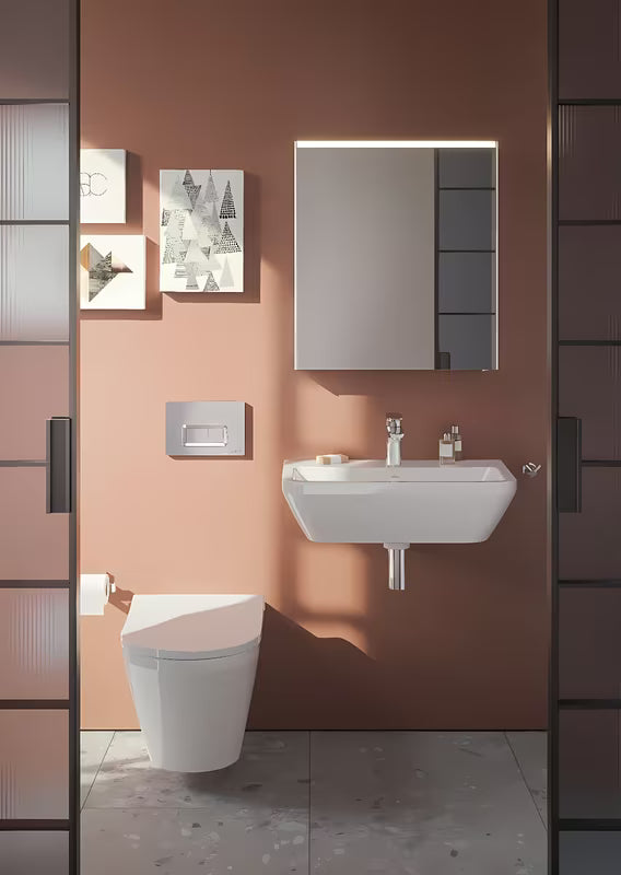 Biała umywalka wisząca Vitra Integra 60x36 cm, ceramiczna, z otworem pro na baterię pośrodku i z przelewem.