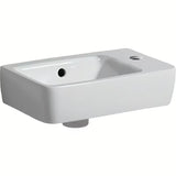 Biała ceramiczna mała umywalka Geberit Selnova Compact 40 x 25 cm z otworem pro na baterię po prawej stronie