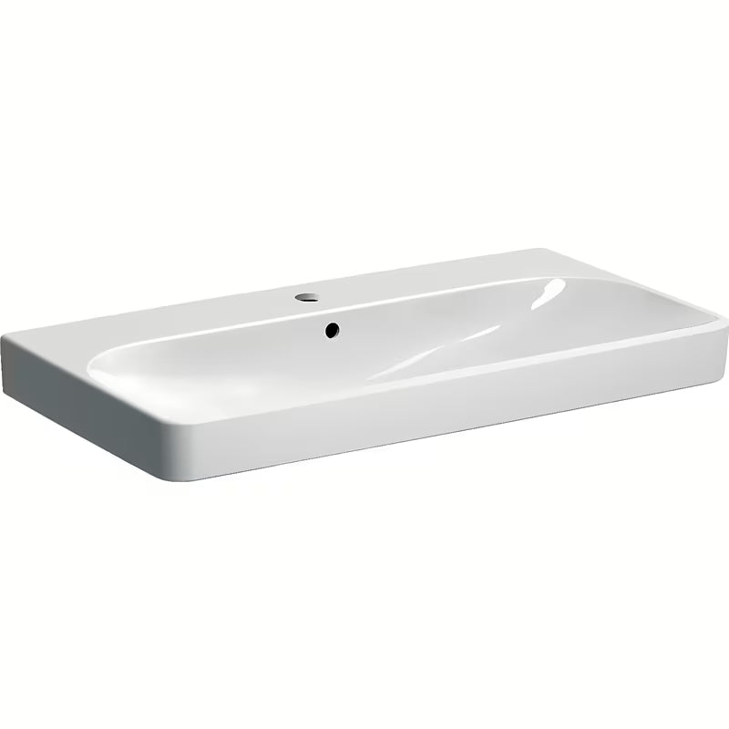 Biała umywalka wisząca Geberit Smyle Square 90x48 cm z ceramiki sanitarnej z przelewem i otworem na baterię pro.