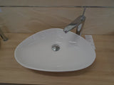 Biała ceramiczna umywalka nablatowa  Glacera Vallone bez przelewu o wymiarach 58,5x38,5 cm.