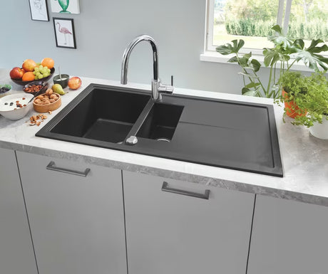 Chromowana bateria zlewozmywakowa Grohe Concetto New z wysoką obrotową wylewką i wyciąganą wylewką prysznicową