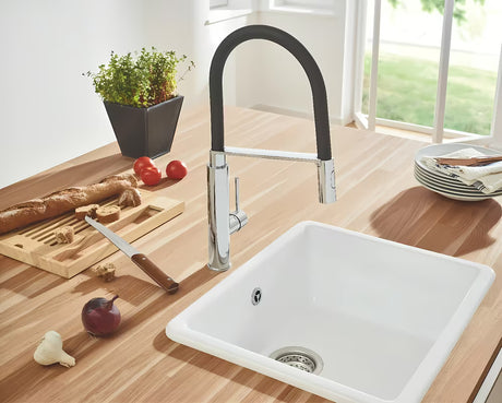 Chromowana bateria zlewozmywakowa Grohe Concetto New z wysoką obrotową wylewką i wyciąganą wylewką natryskową