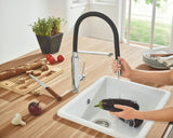 Chromowana bateria zlewozmywakowa Grohe Concetto New z wysoką obrotową wylewką i wyciąganą wylewką natryskową