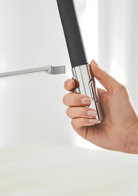 Chromowana bateria zlewozmywakowa Grohe Concetto New z wysoką obrotową wylewką i wyciąganą wylewką natryskową