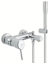 Chromowana ścienna bateria wannowa Grohe Concetto New z zestawem prysznicowym z automatycznym przełączaniem wanna/prysznic.