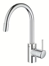 Chromowana bateria zlewozmywakowa Grohe Concetto New z wysoką obrotową wylewką i wyciąganą wylewką natryskową.