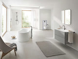 Jednouchwytowa stojąca bateria umywalkowa Grohe Essence z odpływem w wykończeniu hard graphite.