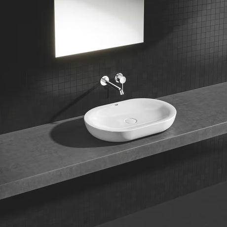 Chromowana podtynkowa bateria umywalkowa Grohe Essence New pro do montażu ściennego z dźwignią i rozetą.