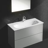 Chromowana bateria umywalkowa Grohe Essence New z odpływem z obrotową wylewką