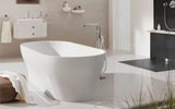 Podłogowa bateria wannowa Grohe Essence New w chromie z rączką prysznicową i obrotową wylewką