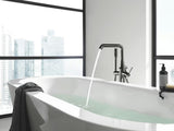 Podłogowa bateria wannowa Grohe Essence New z zestawem prysznicowym w wykończeniu Hard Graphite.