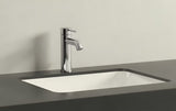 Chromowana jednouchwytowa bateria umywalkowa Grohe Essence New z zestawem odpływowym i zakrzywioną wylewką.