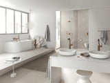Wysoka bateria umywalkowa Grohe Essence New w kolorze warm sunset z obrotową wylewką