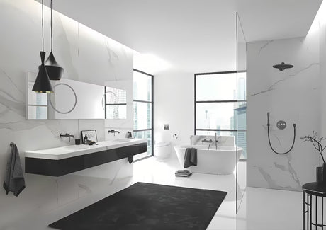 Metalowy łazienkowy haczyk Grohe Essentials w wykończeniu Brushed Hard Graphite z ukrytym mocowaniem.