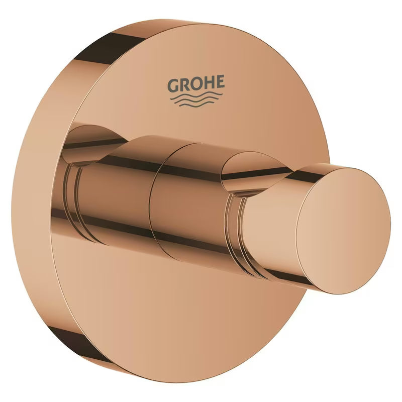 Haczyk na szlafrok Grohe Essentials w wykończeniu warm sunset z ukrytym mocowaniem i powłoką Grohe StarLight.