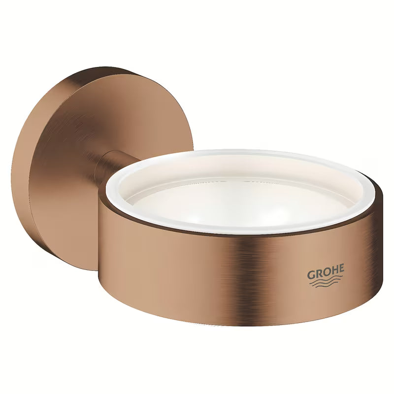Metalowy uchwyt bez szklanki Grohe Essentials w wykończeniu Brushed Warm Sunset, z ukrytym mocowaniem.