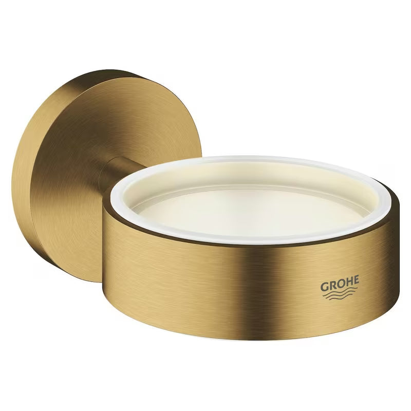 Metalowy uchwyt Grohe Essentials w wykończeniu Brushed Cool Sunrise, z ukrytym mocowaniem.