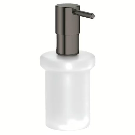 Dozownik do Mydła Grohe Essentials bez uchwytu w wykończeniu hard graphite, szklany pojemnik i metalowe elementy.