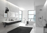 Dozownik do Mydła Grohe Essentials bez uchwytu w wykończeniu hard graphite, szklany pojemnik i metalowe elementy.