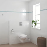 Chromowany zestaw akcesoriów łazienkowych Grohe Essentials z haczykiem, uchwytem na papier z pokrywą i szczotką MISKA wc