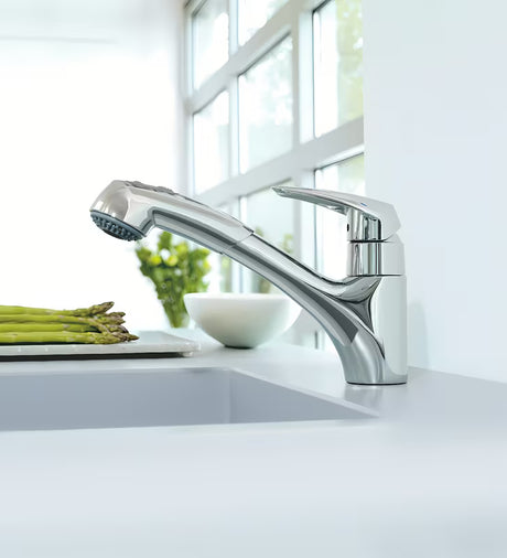Chromowana bateria zlewozmywakowa Grohe Eurodisc z wyciąganą wylewką z obrotową wylewką