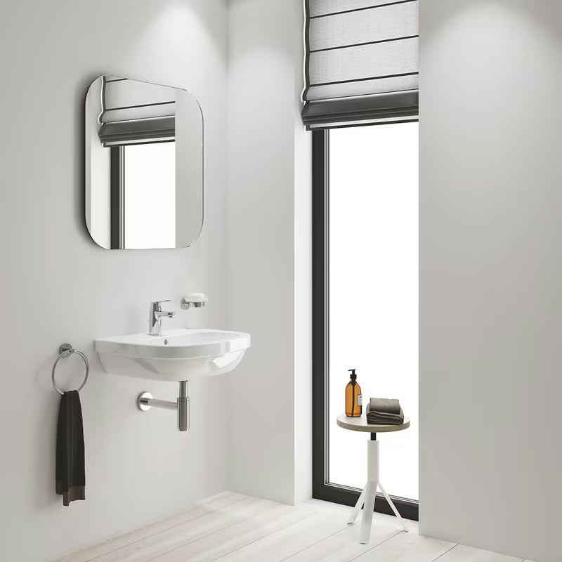 Chromowana jednouchwytowa bateria umywalkowa Grohe Eurosmart Cosmopolitan z zestawem odpływowym
