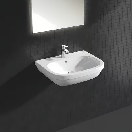 Chromowana bateria umywalkowa Grohe Eurosmart Cosmopolitan z dźwignią i korkiem automatycznym