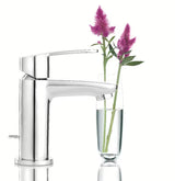 Chromowana bateria umywalkowa Grohe Eurostyle Cosmopolitan z dźwignią i korkiem spustowym