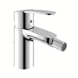 Chromowana bateria bidetowa Grohe Eurostyle Cosmopolitan z odpływem z sterowaniem dźwigniowym.