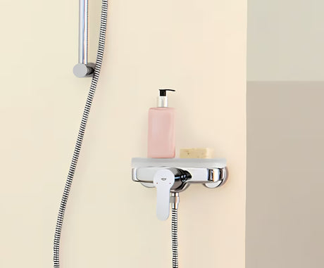 Chromowana ścienna jednouchwytowa bateria prysznicowa Grohe Eurostyle Cosmopolitan z technologią Grohe SilkMove