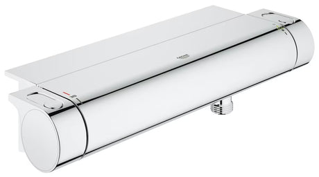 Chromowana termostatyczna bateria prysznicowa Grohe Grohtherm 2000 z półką EasyReach pro wygodna obsługa.