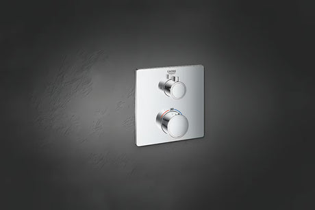 Chromowana podtynkowa termostatyczna bateria prysznicowa Grohe Grohtherm pro sterowanie deszczownicą i słuchawką prysznicową prysznice.