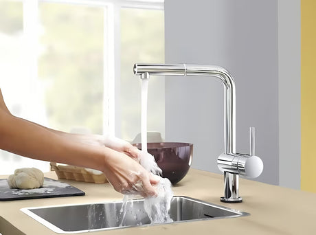 Chromowana bateria zlewozmywakowa Grohe Minta z wysoką wylewką L i wyciąganą wylewką prysznicową