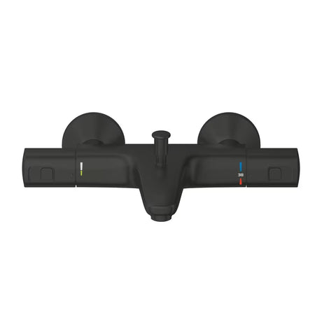 Termostatyczna ścienna bateria wannowa Grohe Precision w wykończeniu matte black z przełącznikiem wanna/prysznic