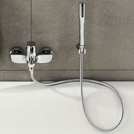 Stały ścienny uchwyt prysznicowy Grohe Rainshower w chromie z rozetą