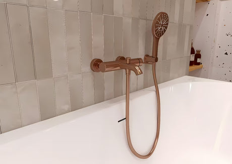 Słuchawka prysznicowa Grohe Rainshower smartactive 130 w wykończeniu brushed warm sunset z przyciskiem SmartTip